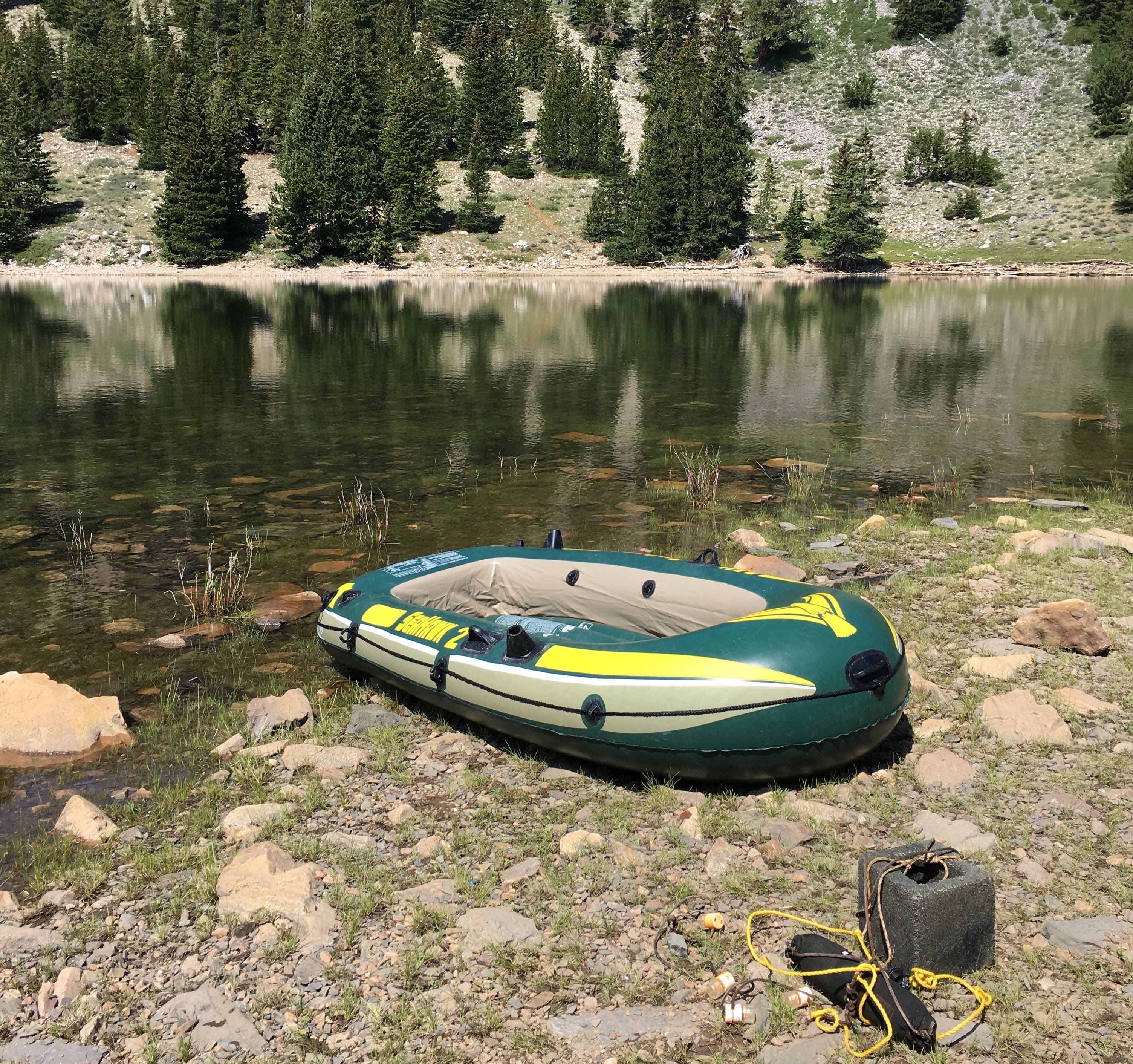Lake temperature sensors are deployed each year in Teresa Lake by boat
